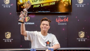 Yap Ghai Pang, the Malaysia Representative, wins the Dragon Dream Trophy in the Poker Dream Manila.